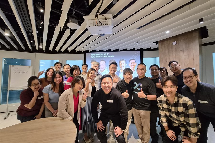Group photo from a Nexius Labs AI workshop in a learning studio