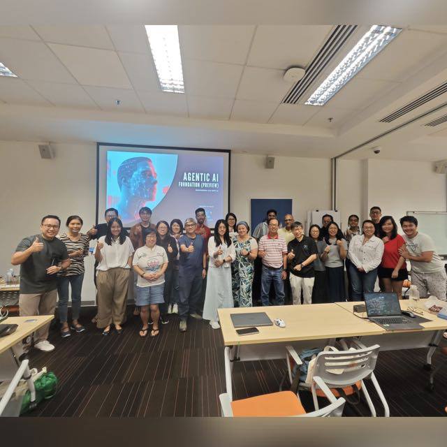 Agentic AI Foundations workshop cohort posing together in the classroom